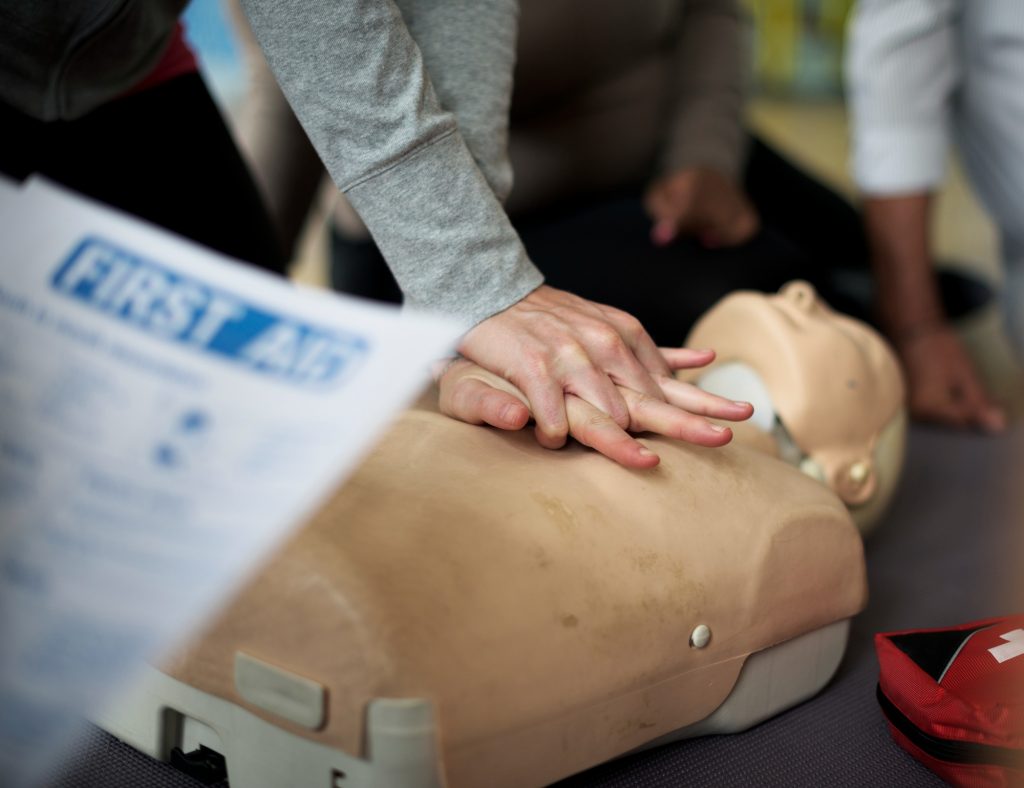 CPR being practiced on a dummy
